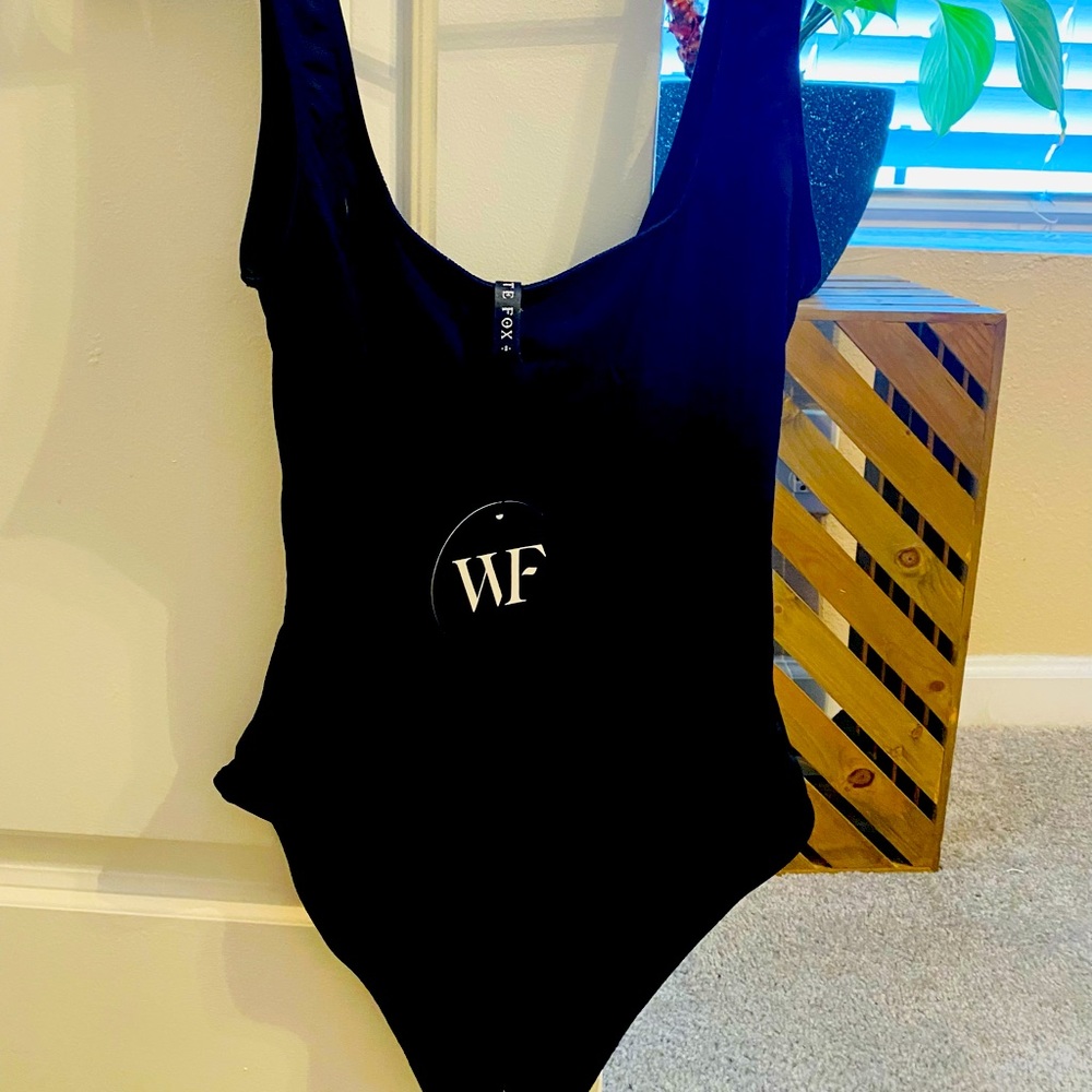 Brand new, only tried on. Didn’t fit.